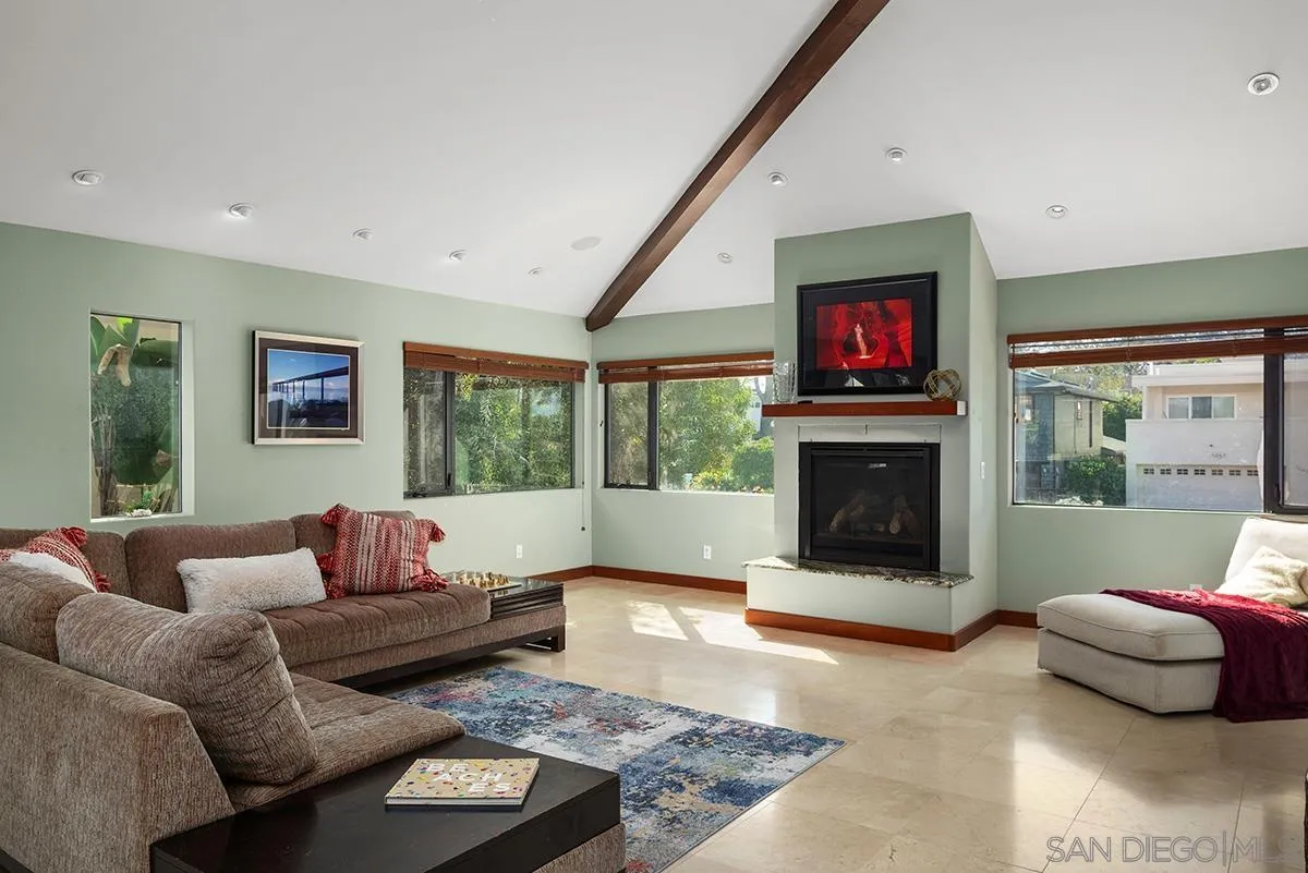 13613 Mar Scenic Drive Del Mar, CA 92014 - Photo 8 of 46 a living room with furniture and a flat screen tv