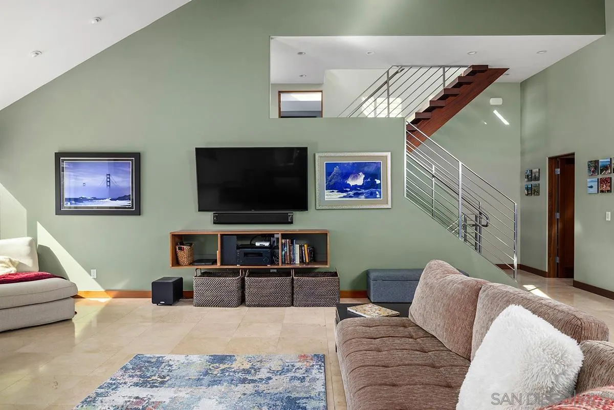 13613 Mar Scenic Drive Del Mar, CA 92014 - Photo 10 of 46 a living room with furniture and a flat screen tv
