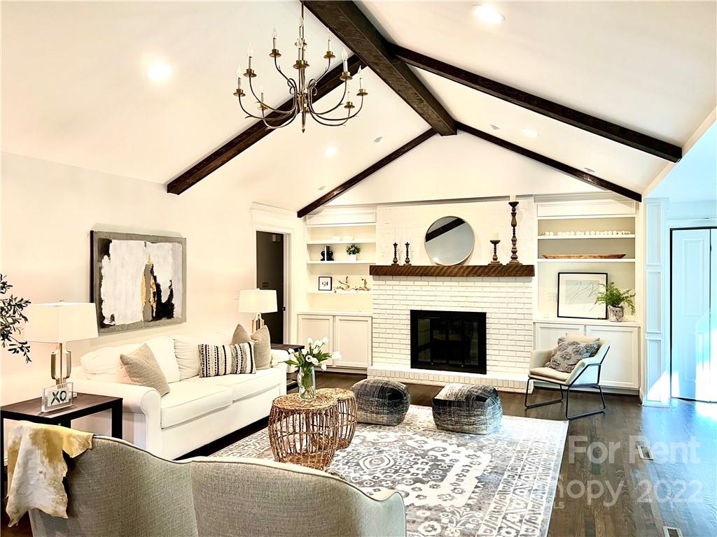 207 Crescent Drive Davidson, NC 28036 - Photo 3 of 3 a living room with furniture and a fireplace