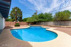 9001 North 13th Avenue Phoenix, AZ 85021 - Photo 23 of 25 a view of a swimming pool with a patio