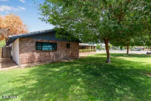a backyard of a house with lots of green space