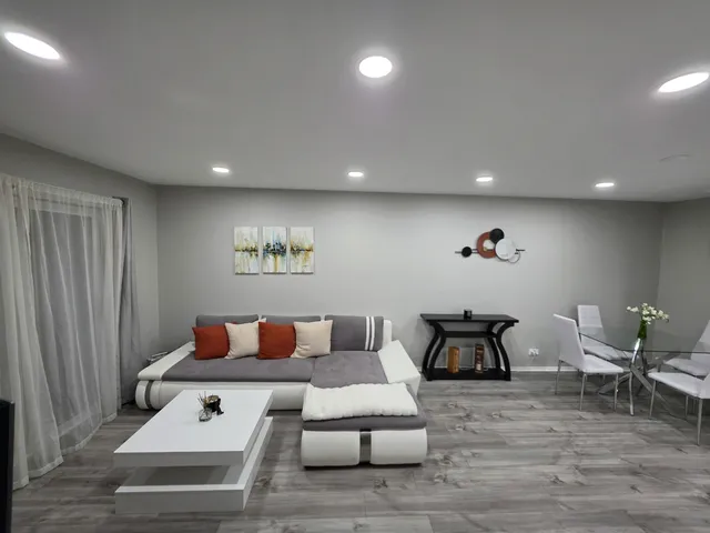 a living room with furniture and a couch