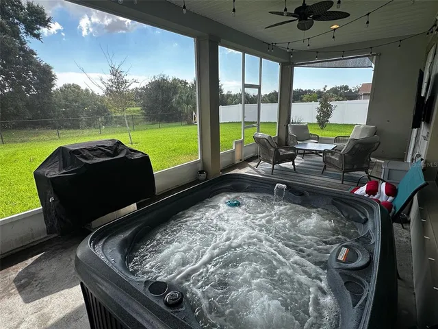 a room with furniture and a flat screen tv