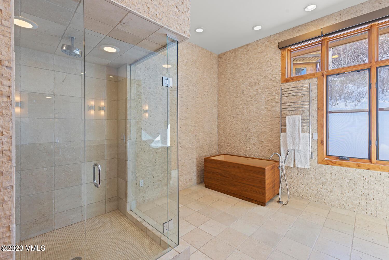 589 Eagle Drive Eagle-Vail, CO 81620 - Photo 13 of 33 a bathroom with a tub shower and sink