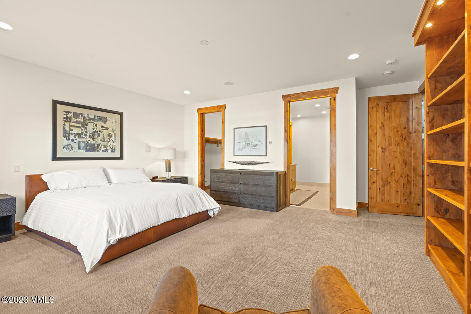 589 Eagle Drive Eagle-Vail, CO 81620 - Photo 14 of 33 a bed room with a bed and a painting