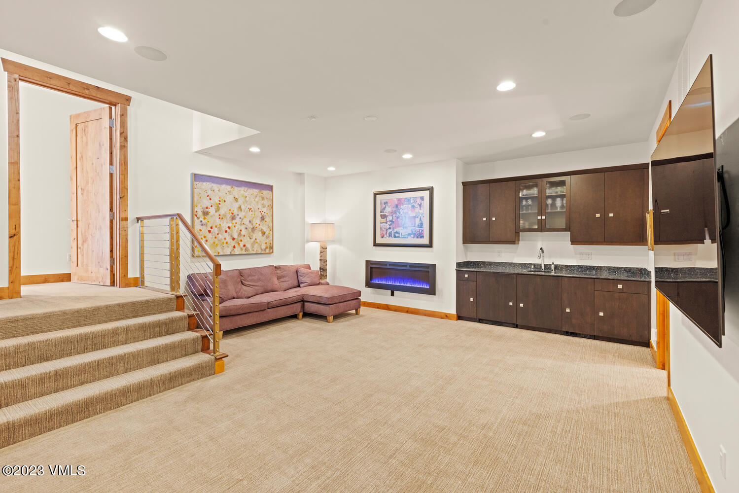 589 Eagle Drive Eagle-Vail, CO 81620 - Photo 17 of 33 a living room with furniture and a wooden floor