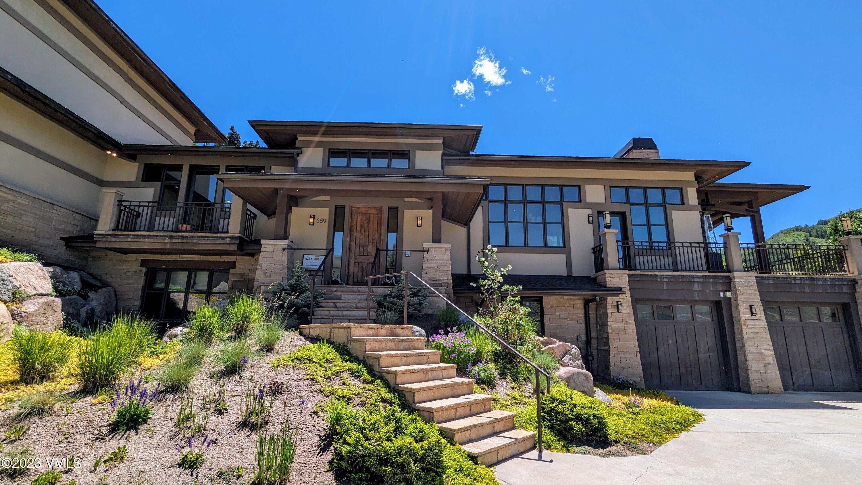 589 Eagle Drive Eagle-Vail, CO 81620 - Photo 20 of 33 a front view of a house with a porch