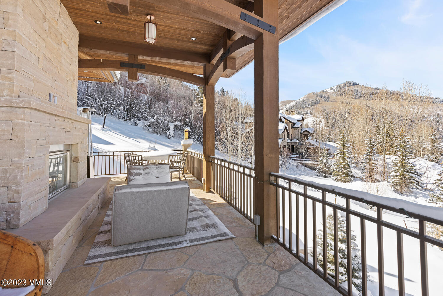 589 Eagle Drive Eagle-Vail, CO 81620 - Photo 26 of 33 a view of a porch with furniture and wooden deck