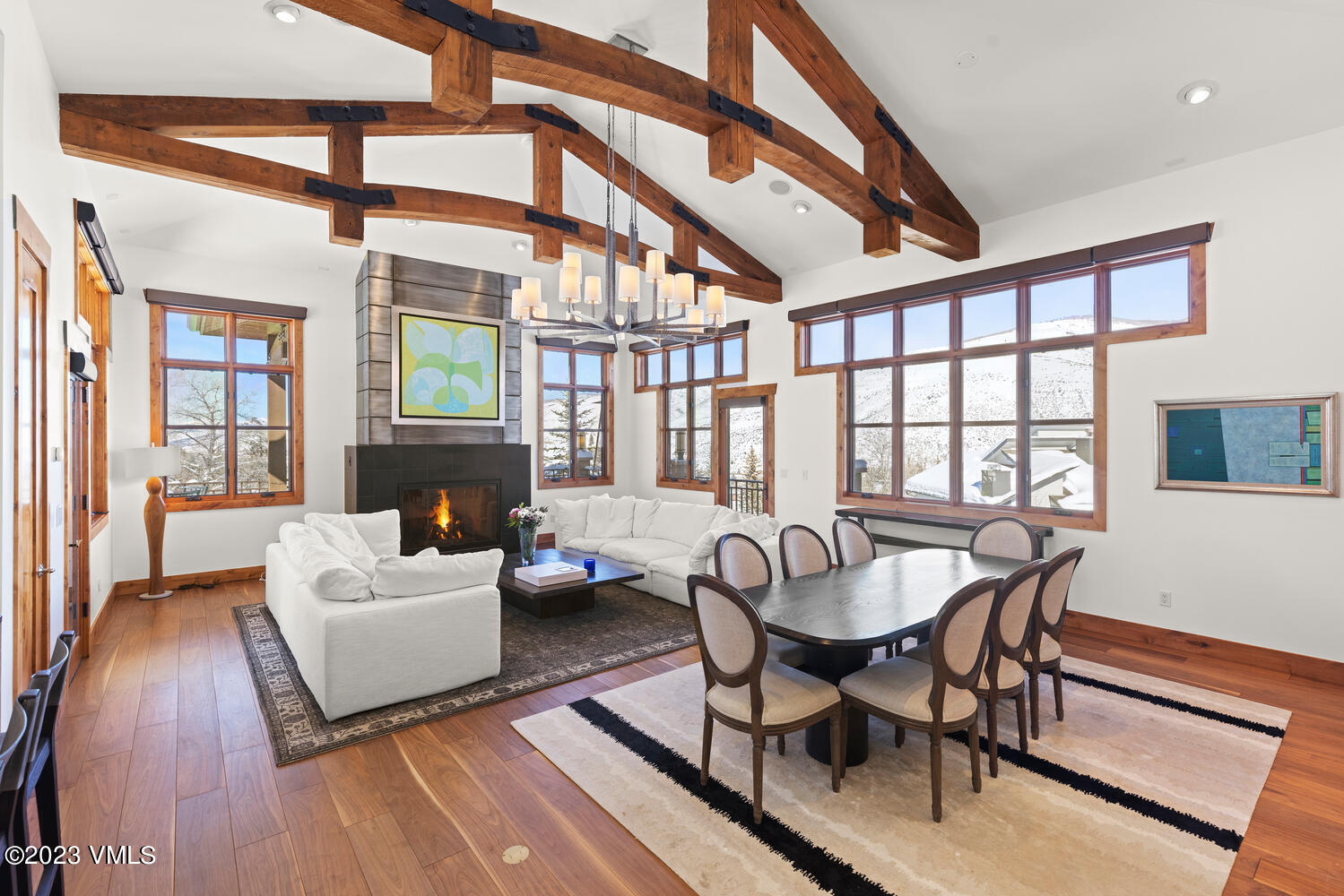 589 Eagle Drive Eagle-Vail, CO 81620 - Photo 3 of 33 a living room with fireplace furniture and a large window