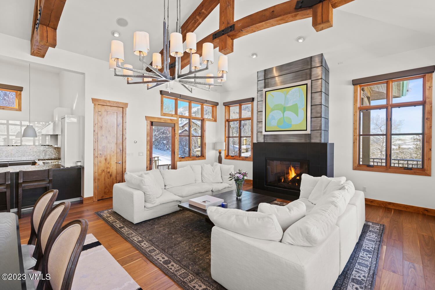 589 Eagle Drive Eagle-Vail, CO 81620 - Photo 5 of 33 a living room with furniture fireplace and a large window