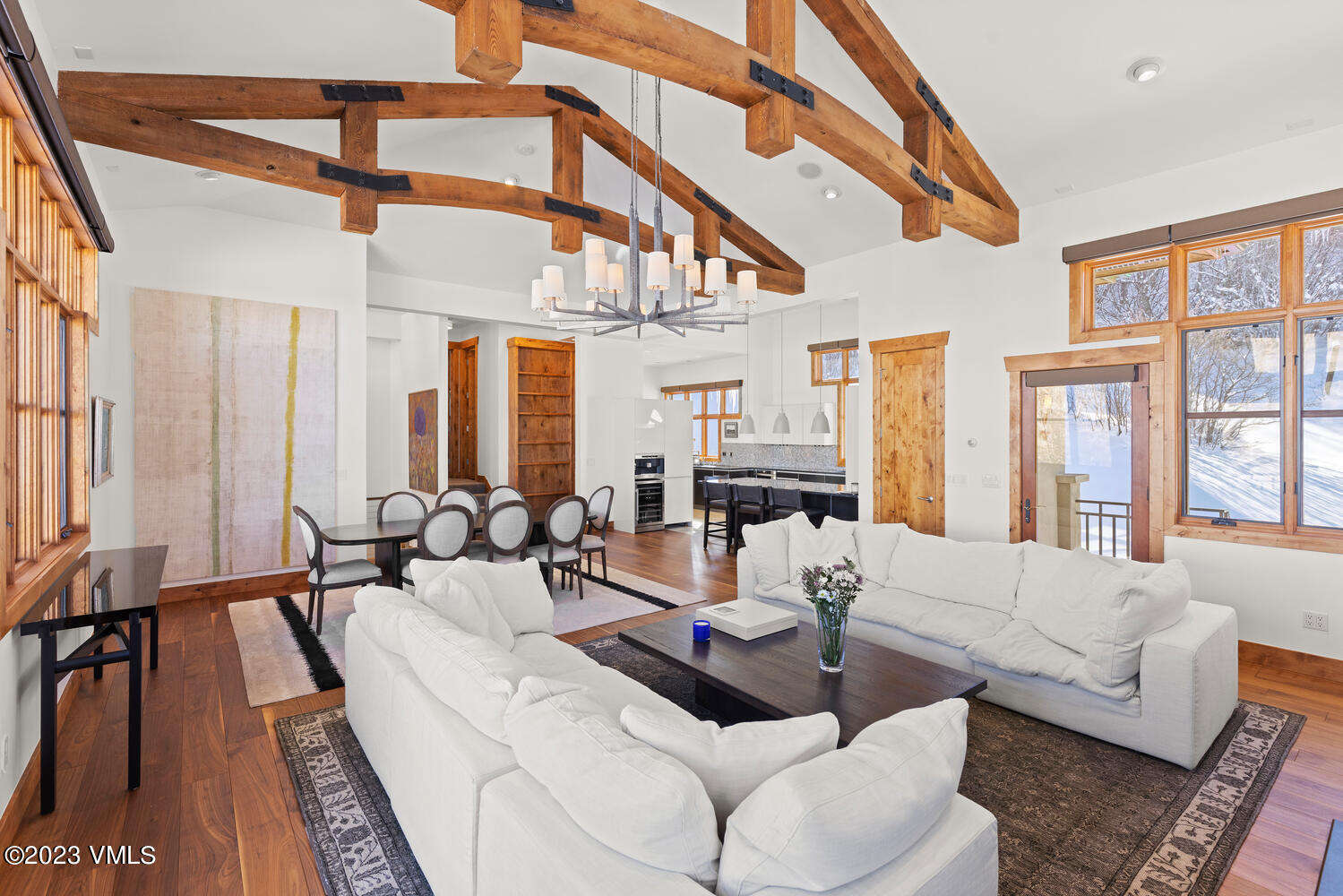 589 Eagle Drive Eagle-Vail, CO 81620 - Photo 6 of 33 a living room with furniture or couch and a large window