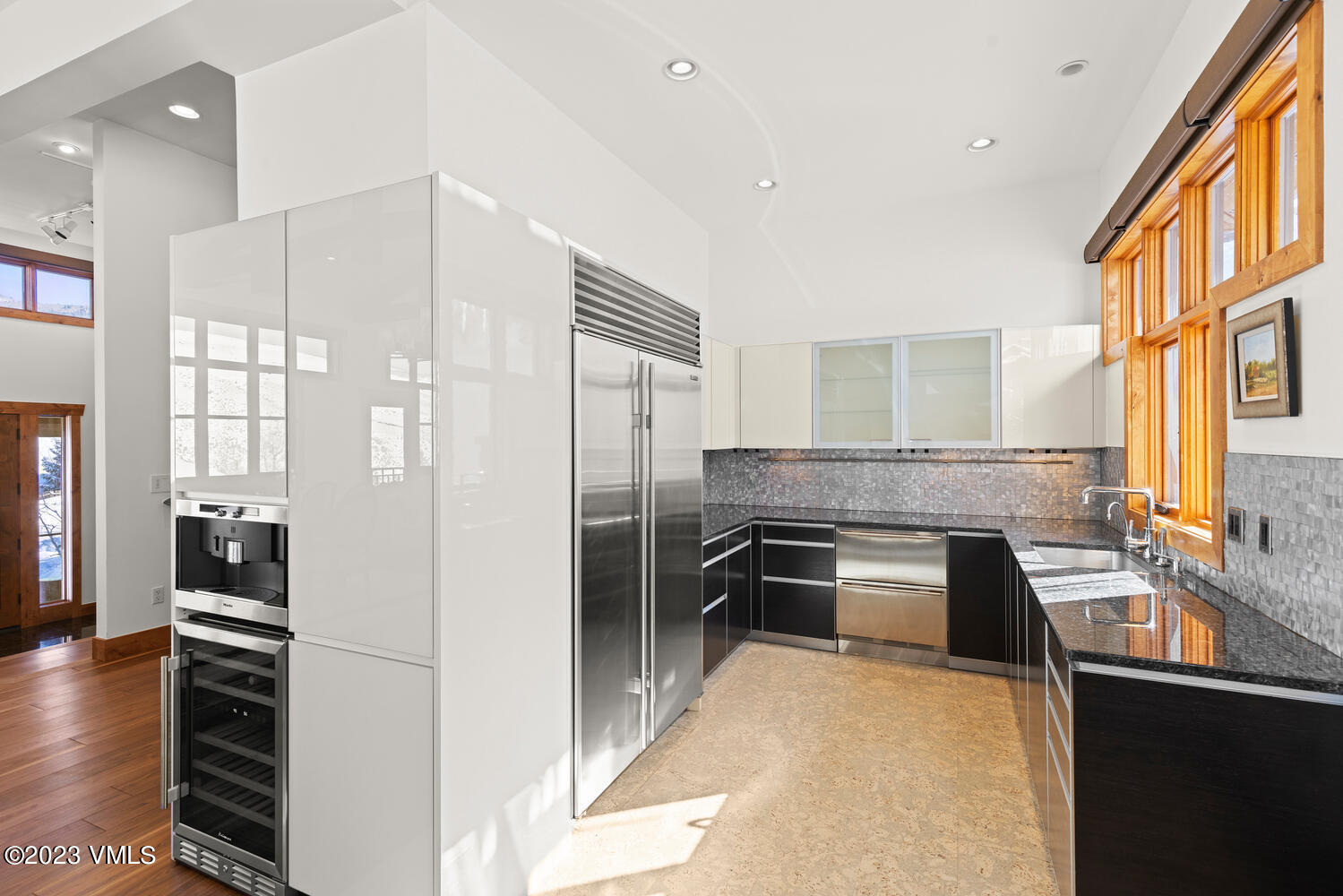 589 Eagle Drive Eagle-Vail, CO 81620 - Photo 9 of 33 a kitchen with stainless steel appliances granite countertop a stove and a refrigerator