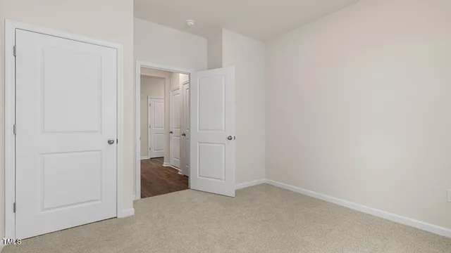 an empty room with closet