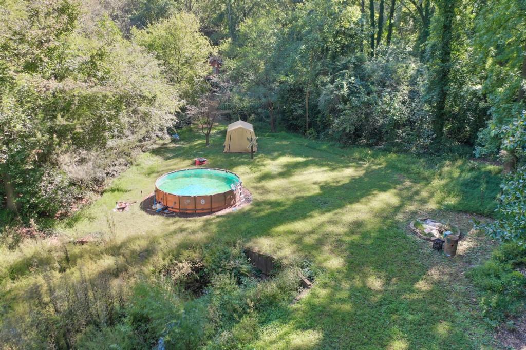 819 Northern Avenue Clarkston, GA 30021 - Photo 14 of 21 a view of a backyard with a fountain