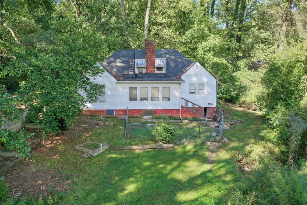 819 Northern Avenue Clarkston, GA 30021 - Photo 5 of 21 front view of a house with a yard