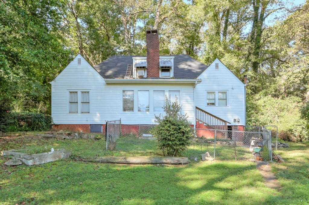819 Northern Avenue Clarkston, GA 30021 - Photo 6 of 21 a front view of house with yard and green space