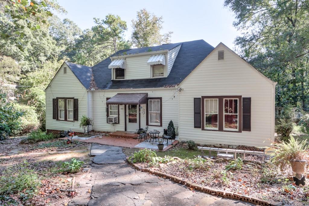 819 Northern Avenue Clarkston, GA 30021 - Photo 7 of 21 a front view of a house with garden