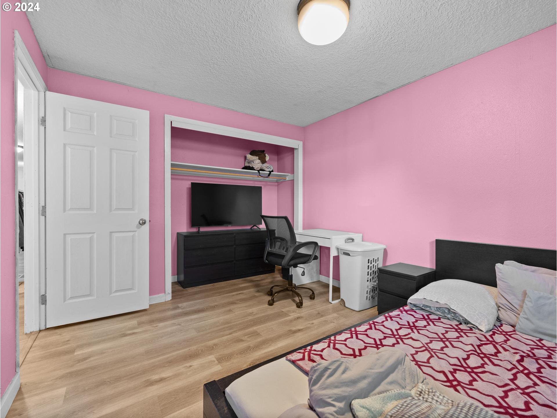 32980 Southwest Firdale Road Cornelius, OR 97113 - Photo 19 of 48 a bedroom with pink walls and bed