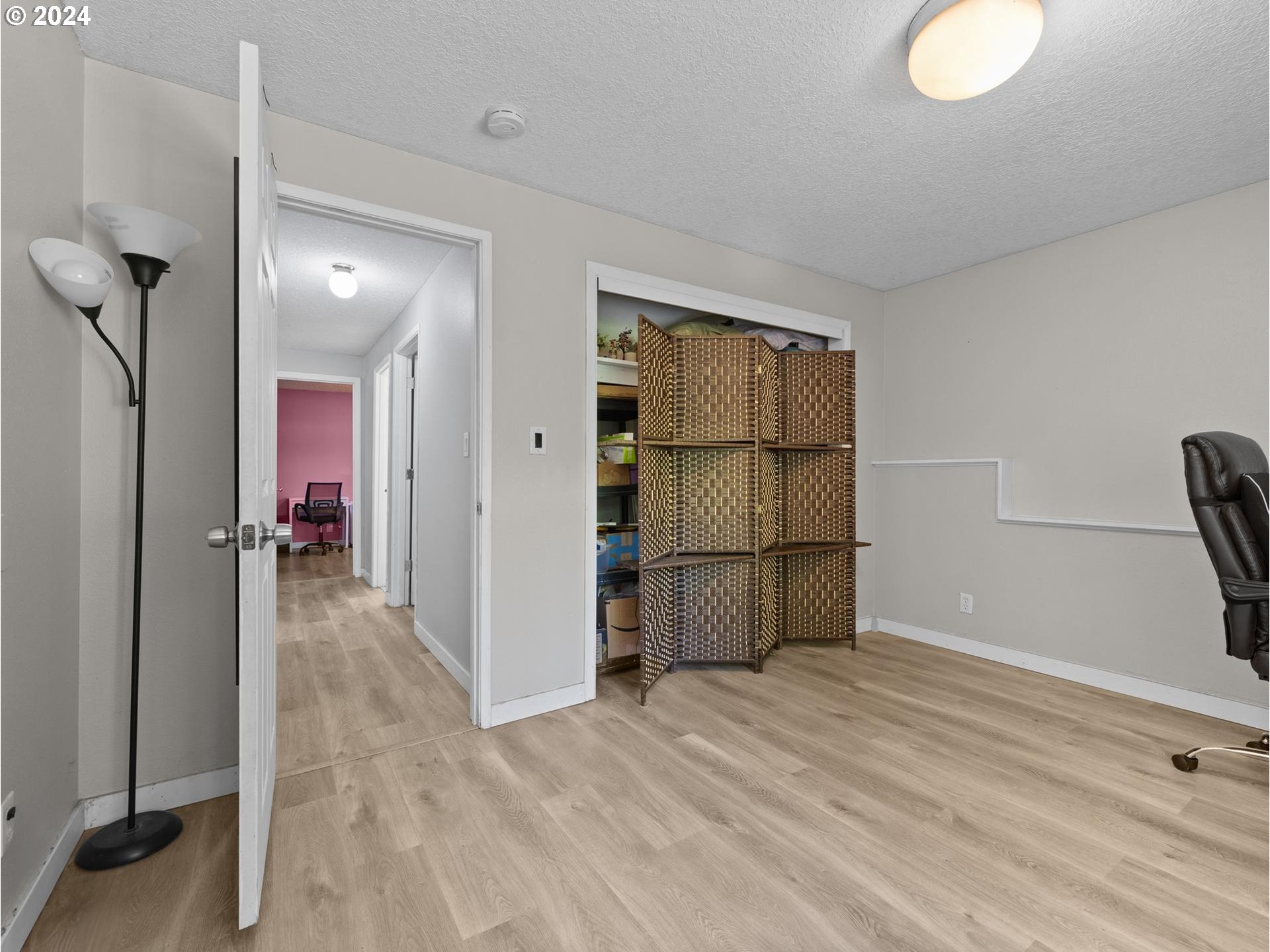 32980 Southwest Firdale Road Cornelius, OR 97113 - Photo 21 of 48 a view of a livingroom with wooden floor and bathroom