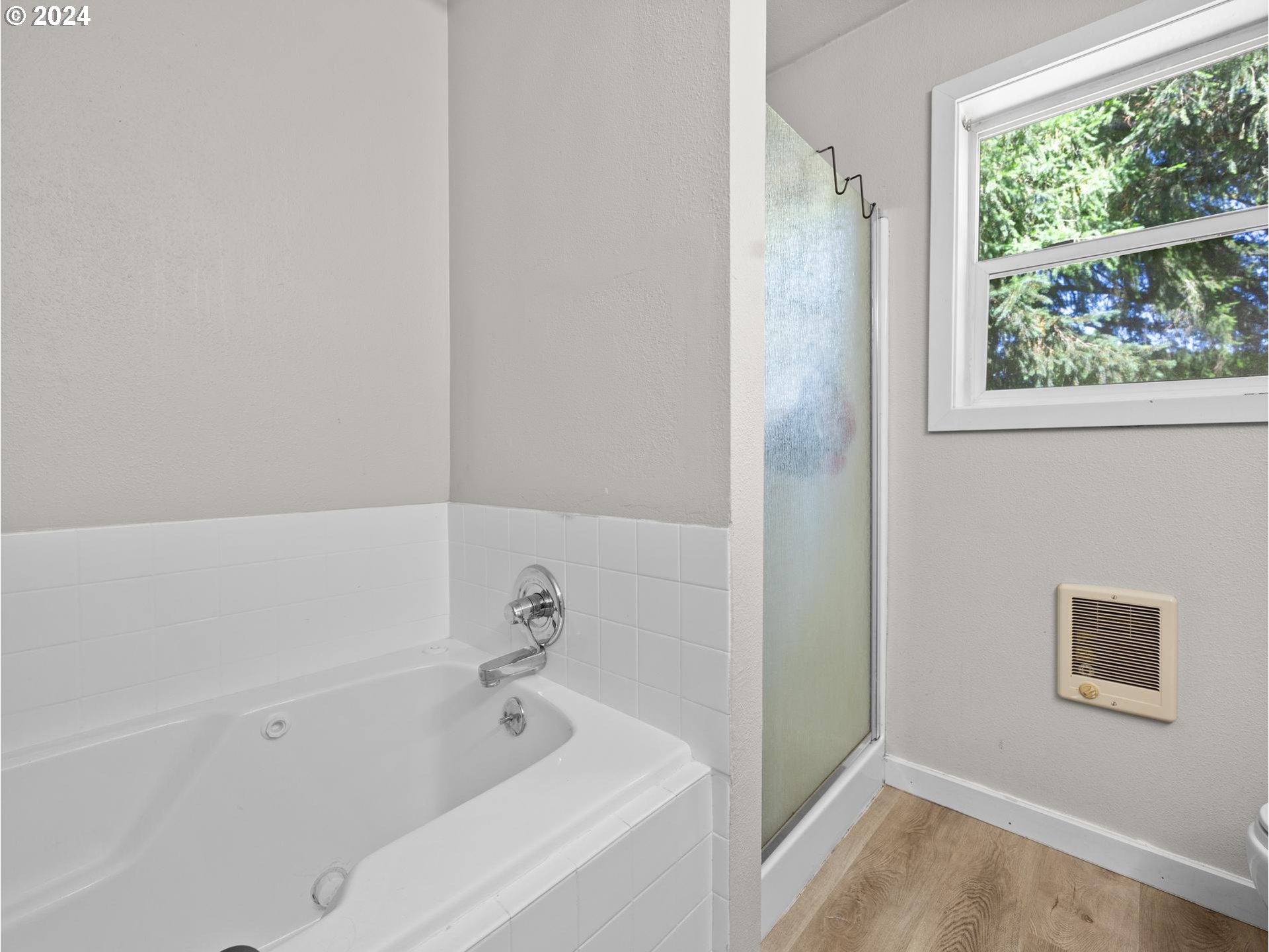 32980 Southwest Firdale Road Cornelius, OR 97113 - Photo 9 of 48 a bathroom with a bathtub and window