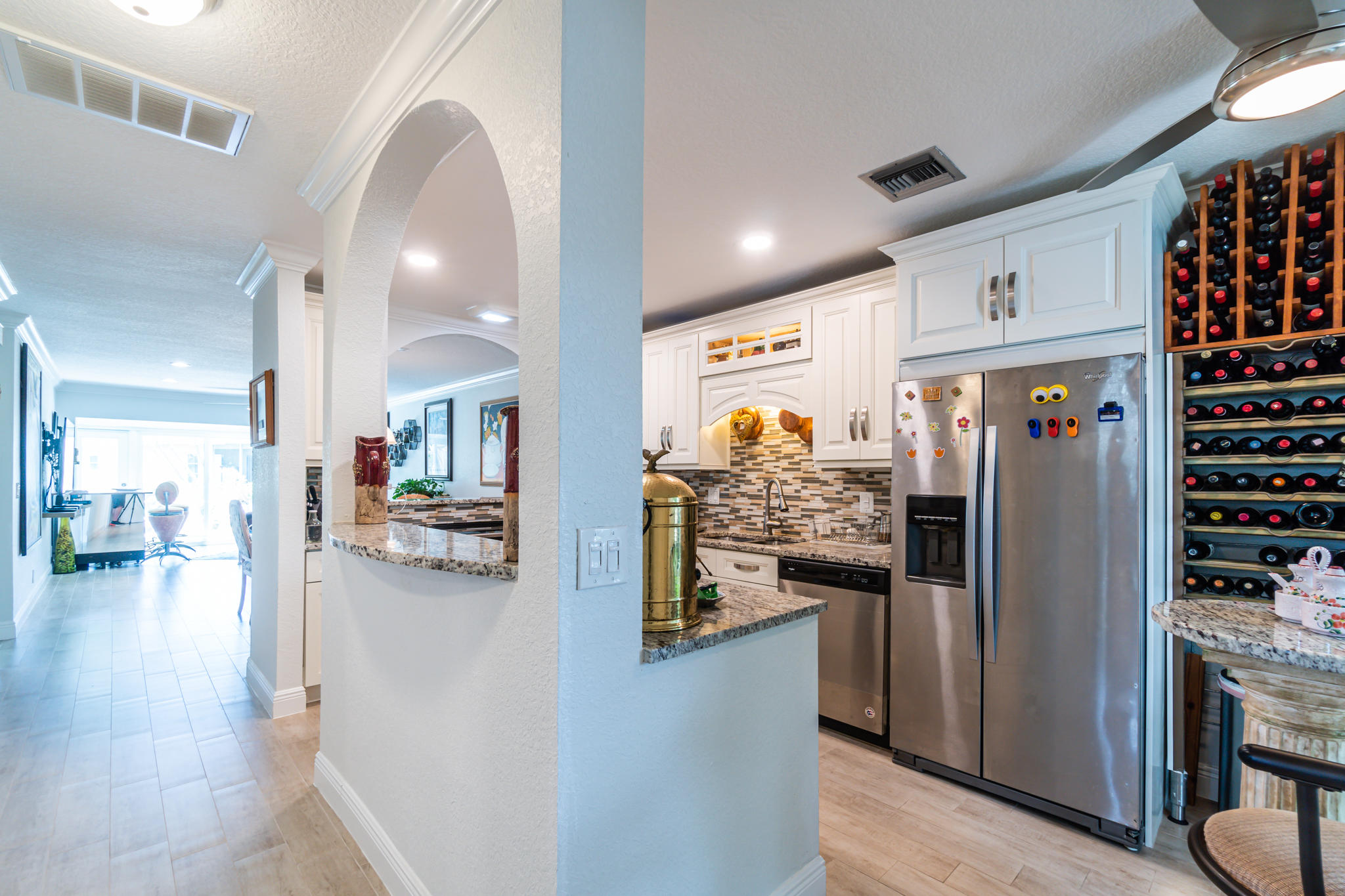 13831 Vía Flora, Unit A Delray Beach, FL 33484 - Photo 2 of 47 a view of a living room and entry way