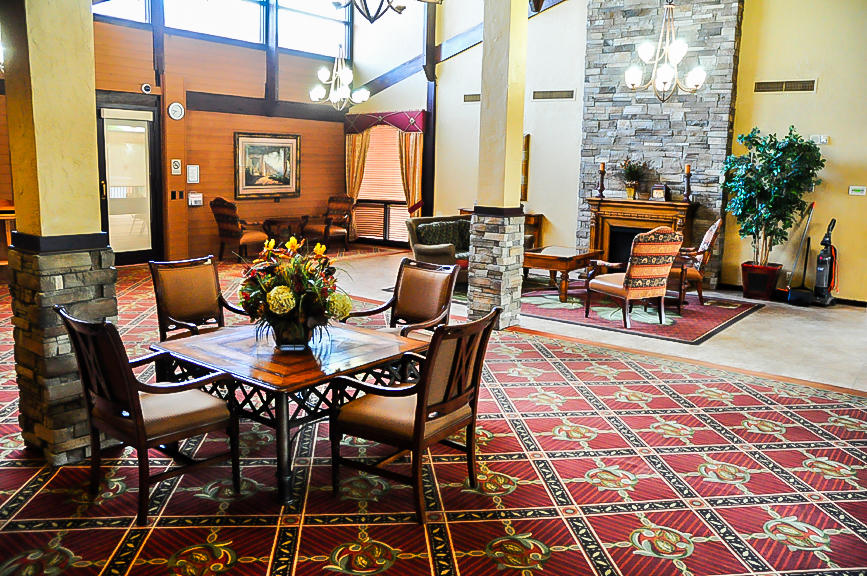 13831 Vía Flora, Unit A Delray Beach, FL 33484 - Photo 31 of 47 a dining room with furniture and outdoor view