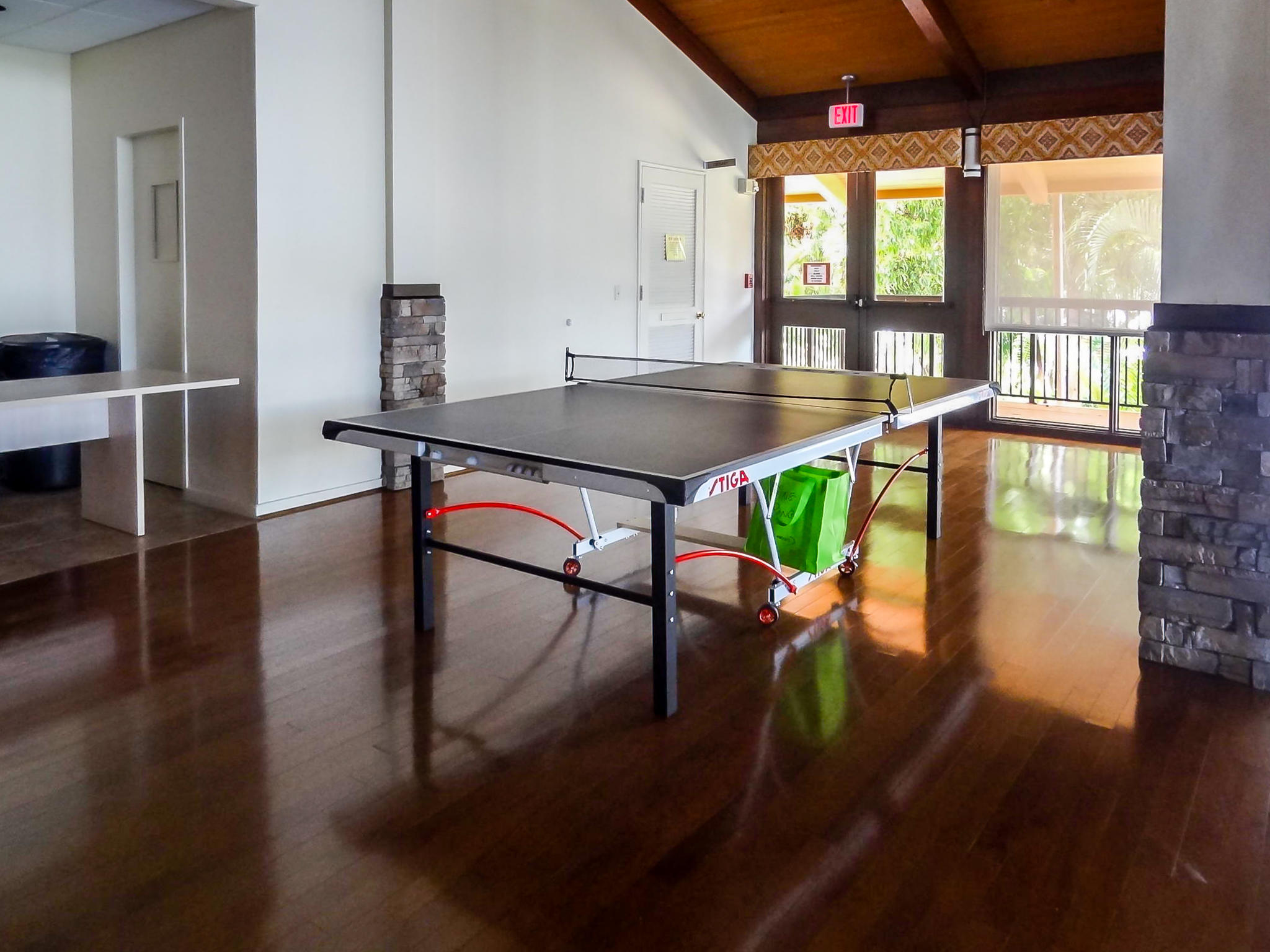 13831 Vía Flora, Unit A Delray Beach, FL 33484 - Photo 36 of 47 a view of a dining room with furniture window and wooden floor