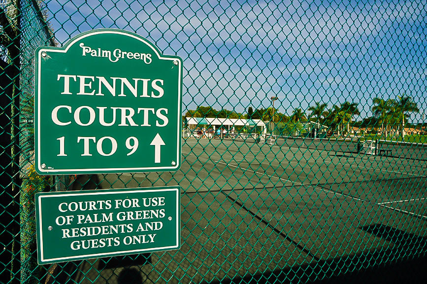 13831 Vía Flora, Unit A Delray Beach, FL 33484 - Photo 40 of 47 a sign on the side of a road