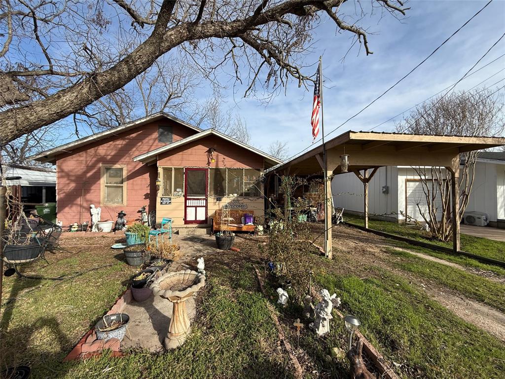 710 Whitney Street Morgan, TX 76671 - Photo 21 of 22 a view of a house with backyard
