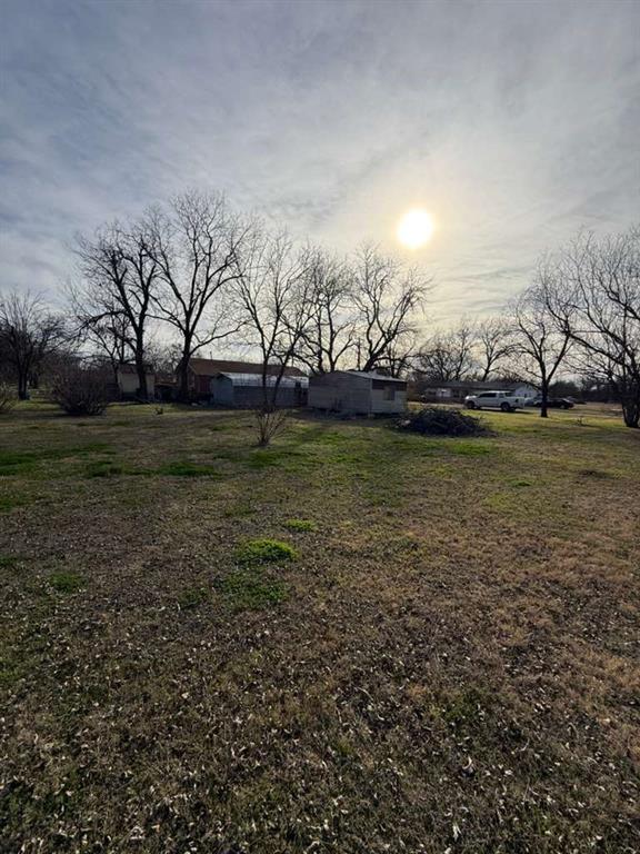 710 Whitney Street Morgan, TX 76671 - Photo 9 of 22 a view of a backyard of the house