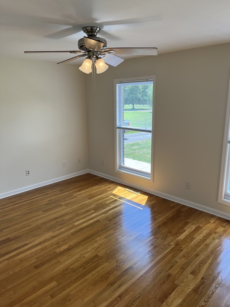 700 Old Liberty Road Alexandria, TN 37012 - Photo 9 of 12 a view of a room with wooden floor and window