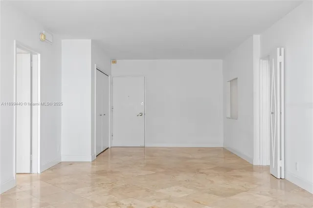 a kitchen with stainless steel appliances granite countertop a refrigerator stove a sink and microwave