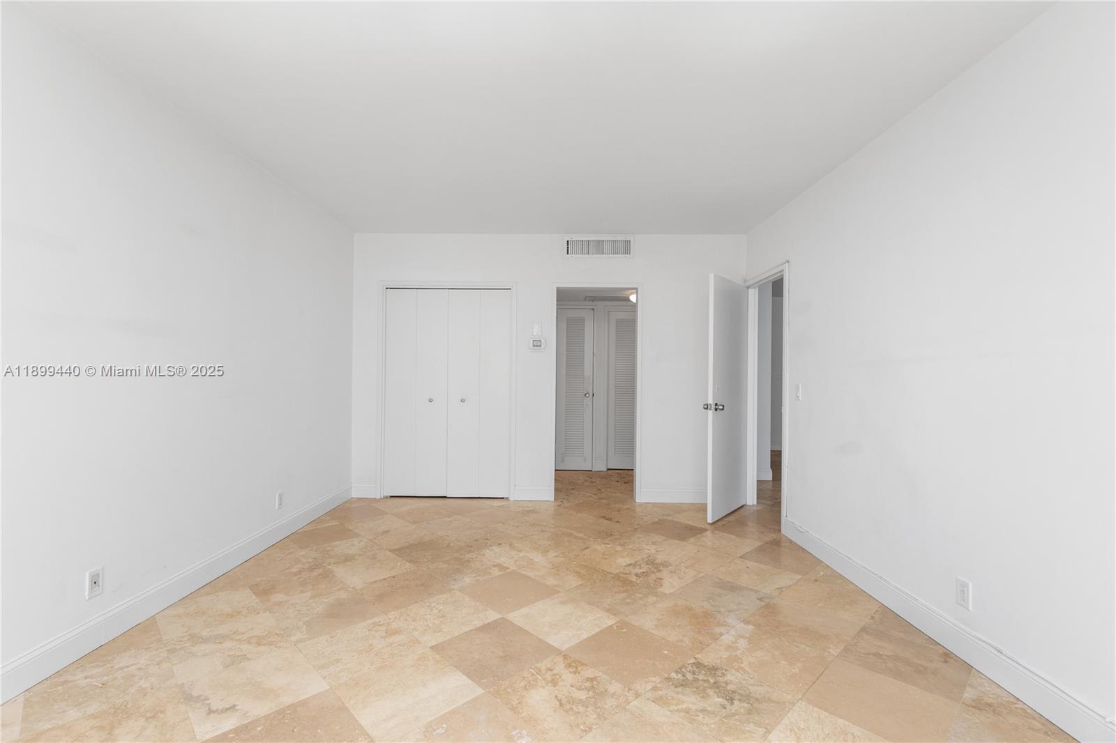 5700 Collins Avenue, Unit 10D Miami Beach, FL 33140 - Photo 21 of 47 a view of an empty room