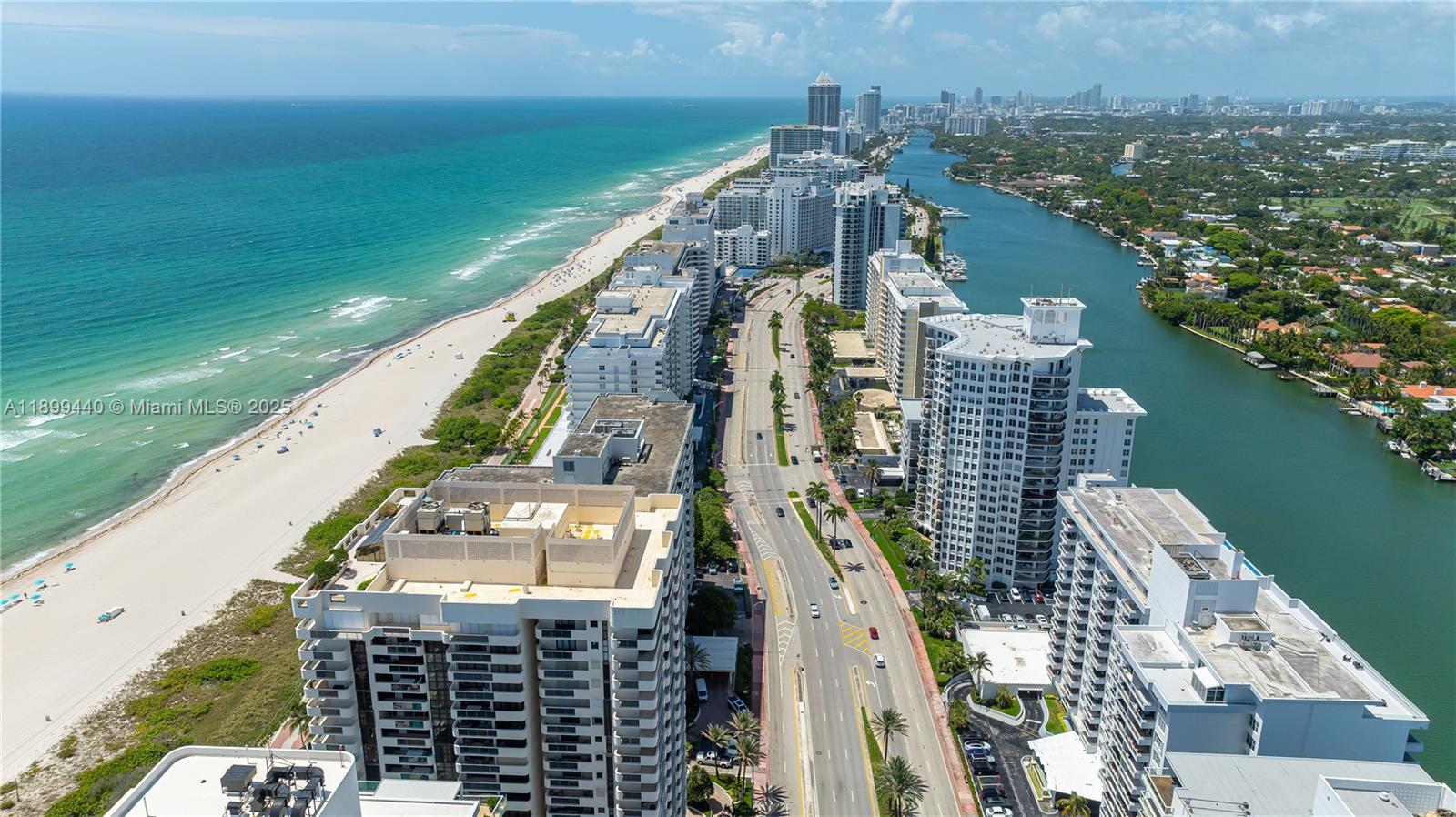5700 Collins Avenue, Unit 10D Miami Beach, FL 33140 - Photo 40 of 47 a view of a city and a lake