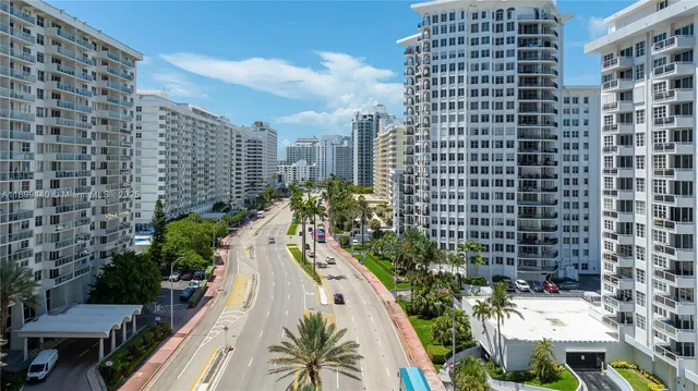 a view of a city with tall buildings in the background