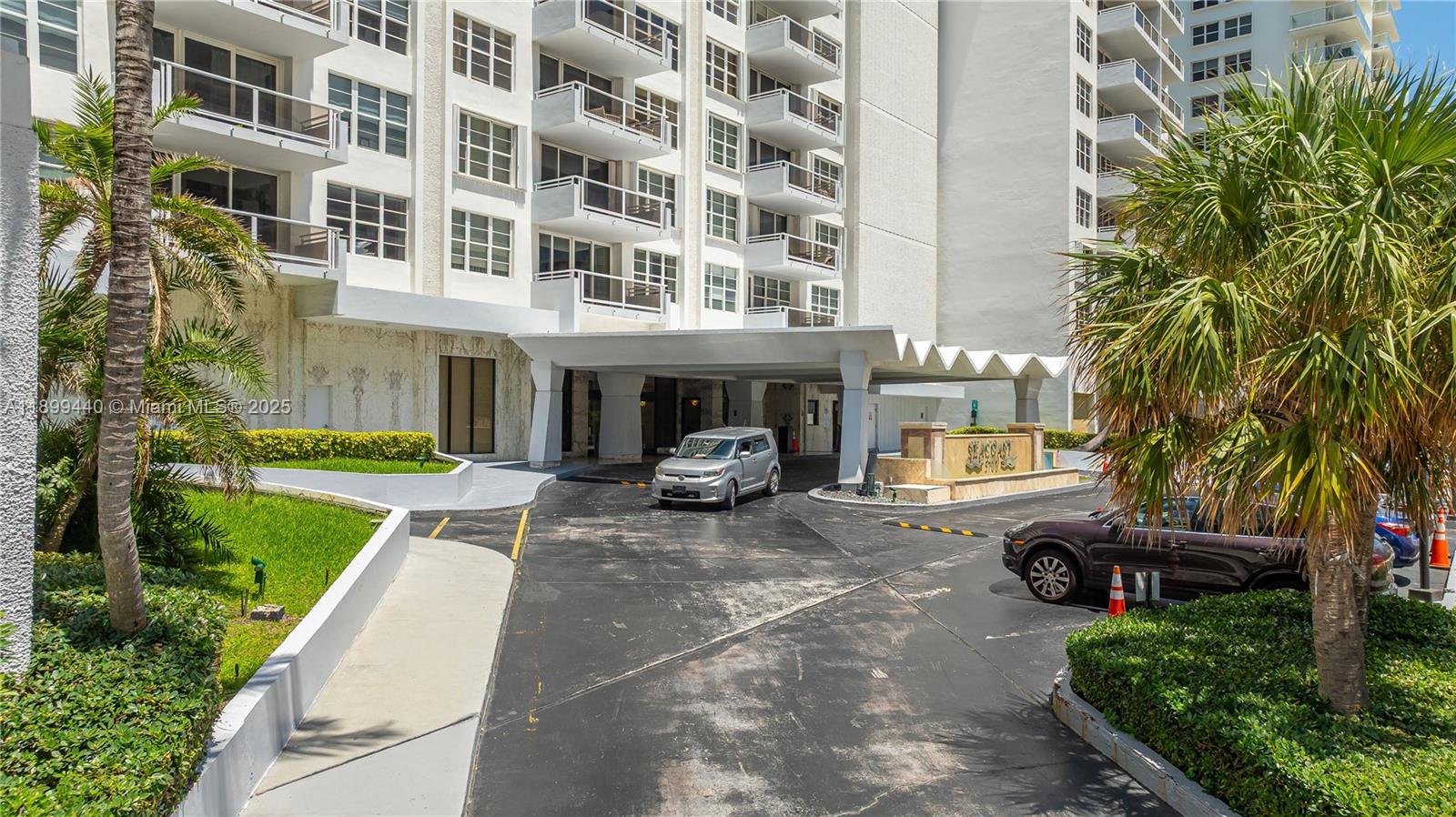 5700 Collins Avenue, Unit 10D Miami Beach, FL 33140 - Photo 42 of 47 a view of a building with garden and sitting area