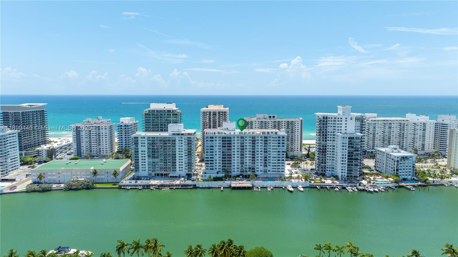 5700 Collins Avenue, Unit 10D Miami Beach, FL 33140 - Photo 43 of 47 a view of a city with tall buildings in the background