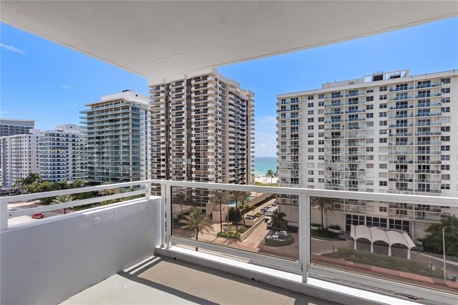 5700 Collins Avenue, Unit 10D Miami Beach, FL 33140 - Photo 5 of 47 a view of a city from a balcony