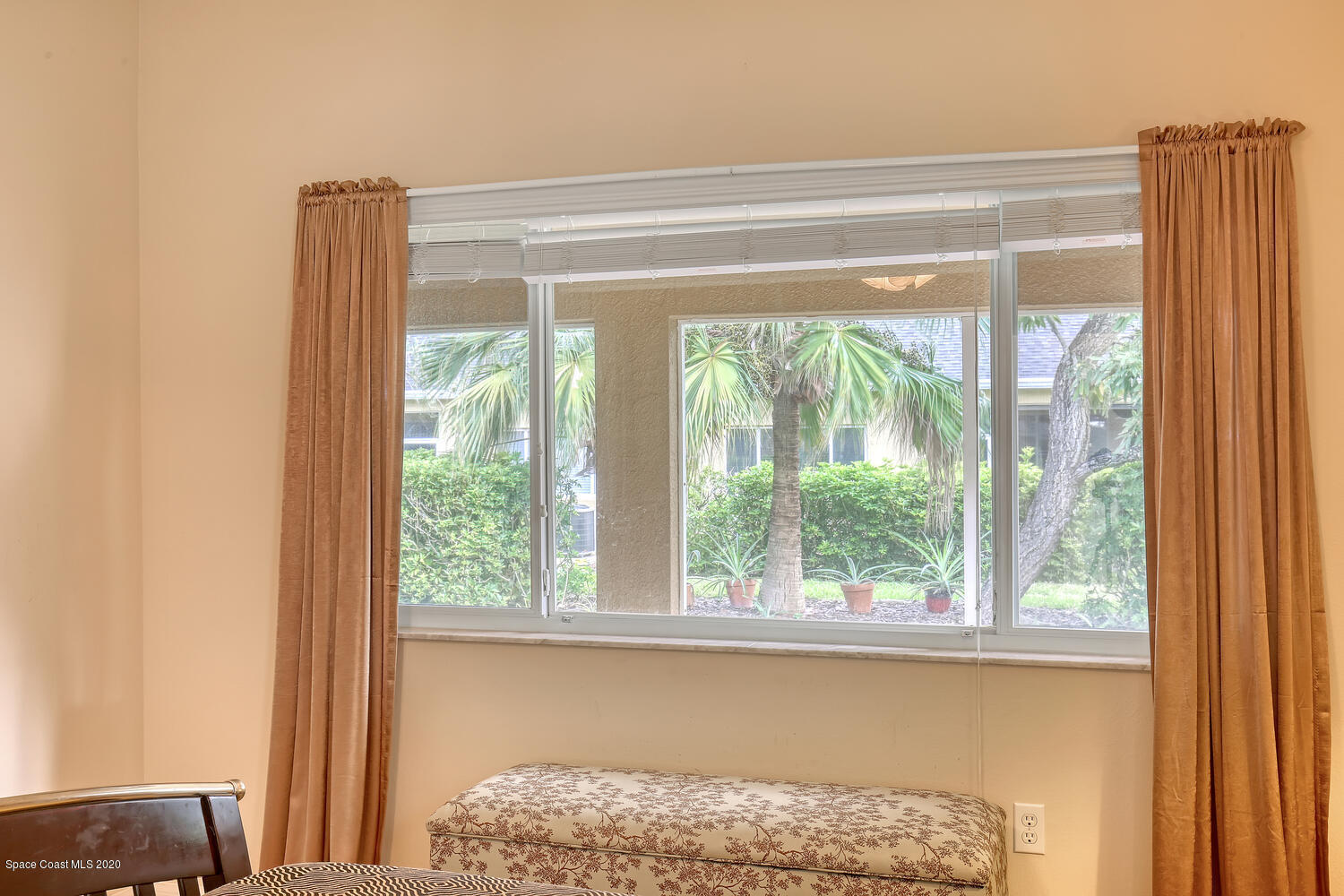 2872 Boddington Way Melbourne, FL 32940 - Photo 12 of 26 Master lots of windows