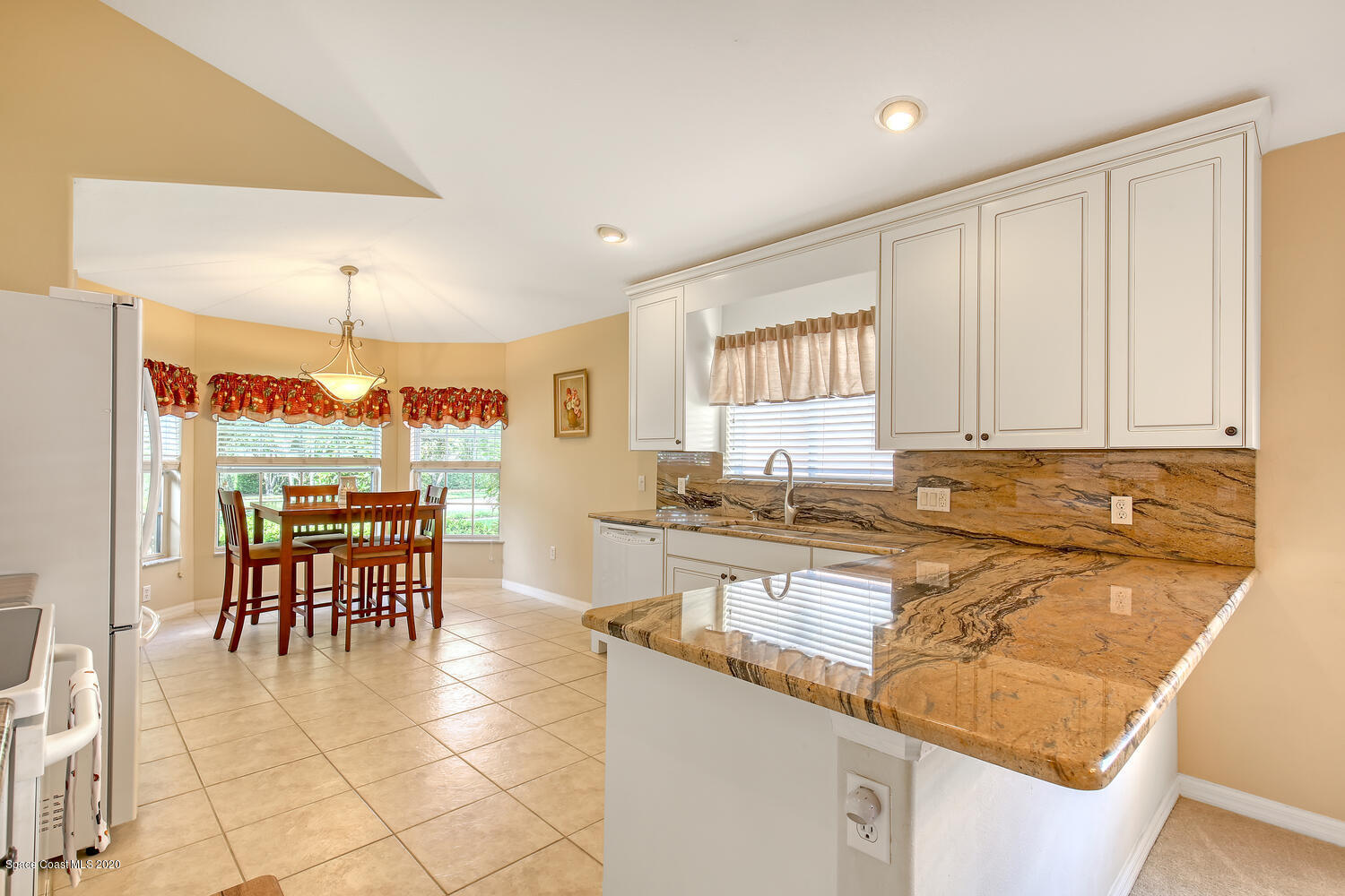 2872 Boddington Way Melbourne, FL 32940 - Photo 9 of 26 Granite Counter and Backsplash