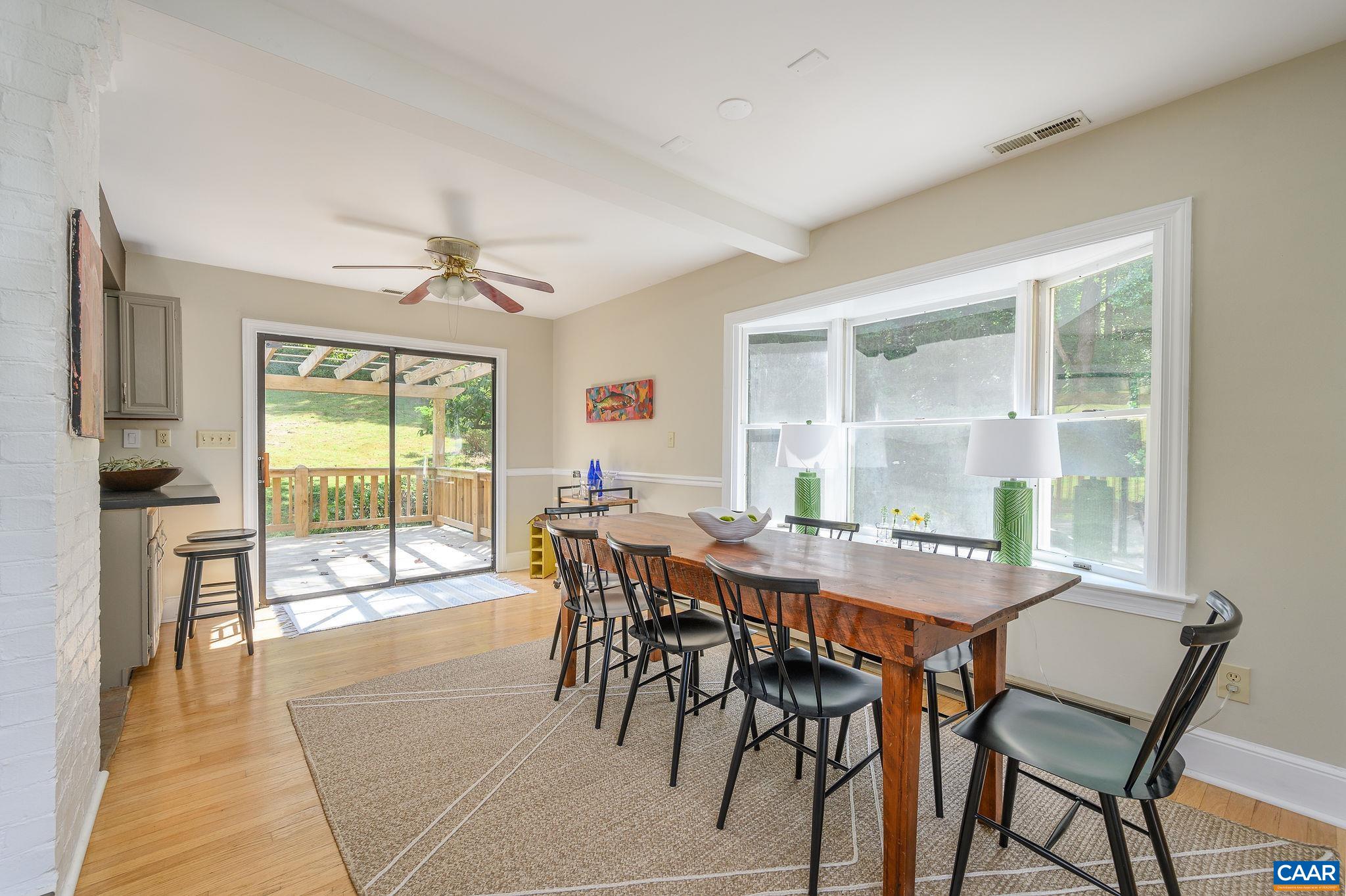 965 Nether Springs Road Afton, VA 22920 - Photo 14 of 38 a view of a dining room with furniture window and outside view