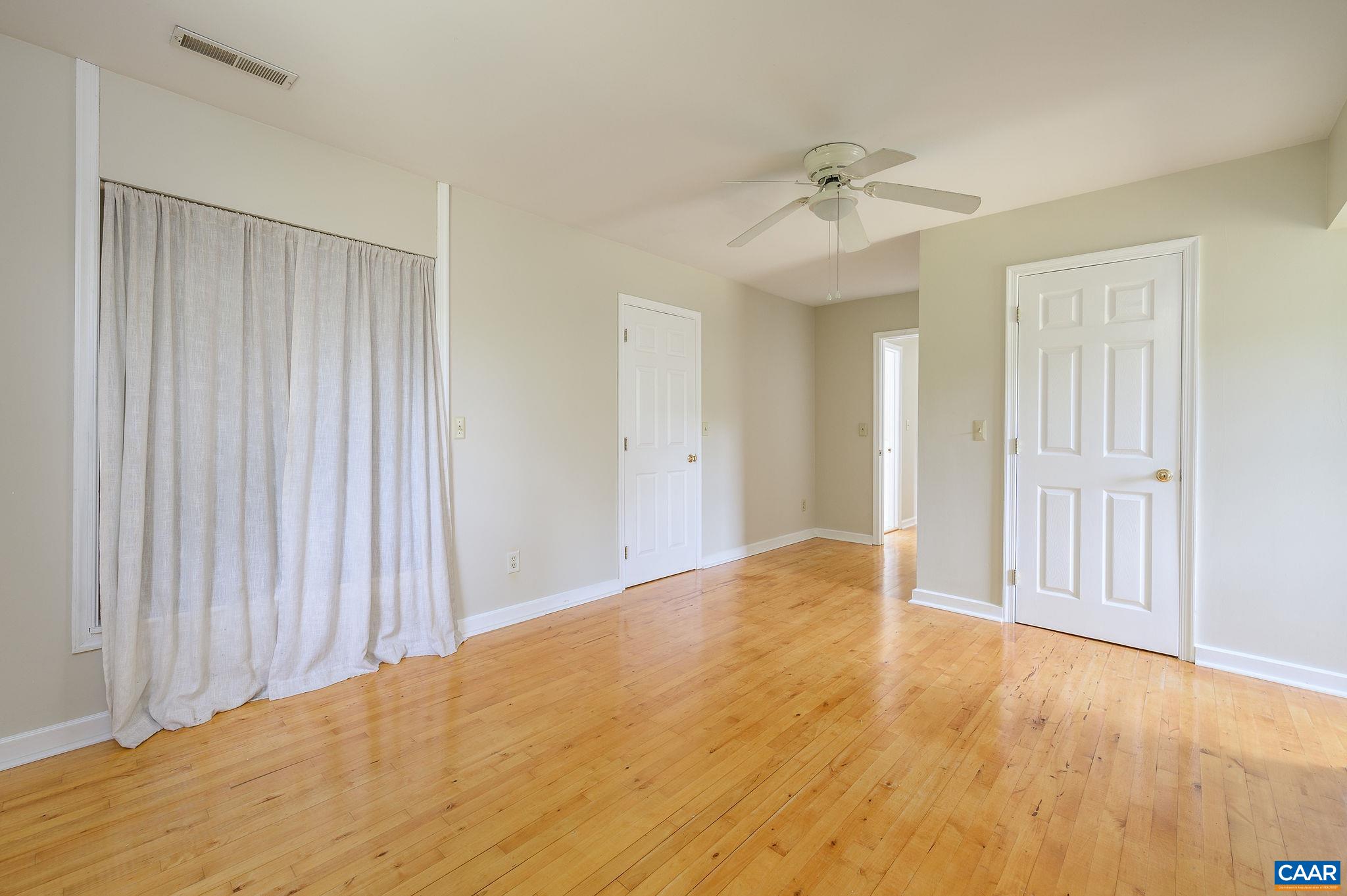 965 Nether Springs Road Afton, VA 22920 - Photo 23 of 38 wooden floor in an empty room