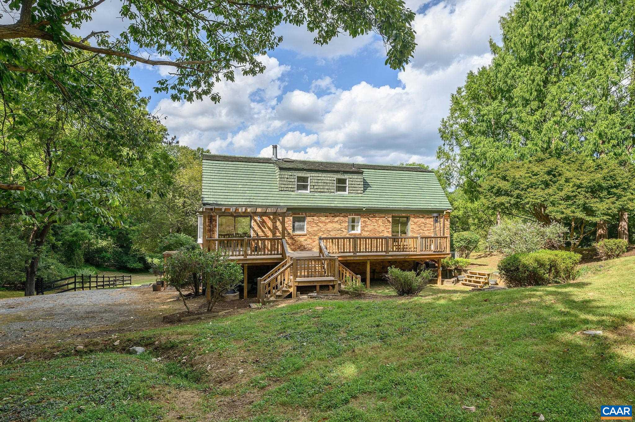 965 Nether Springs Road Afton, VA 22920 - Photo 31 of 38 an aerial view of a house with a garden
