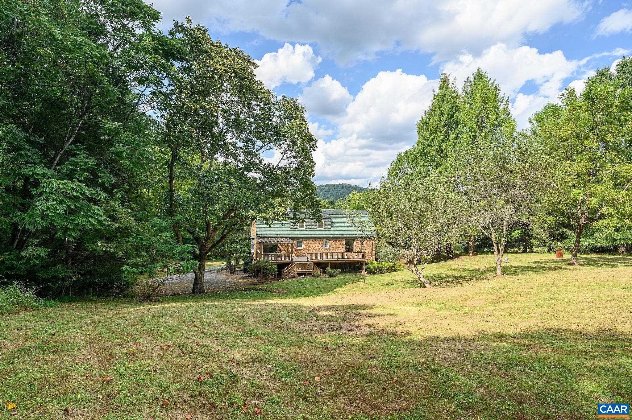 965 Nether Springs Road Afton, VA 22920 - Photo 34 of 38 a view of a house with a yard and sitting area