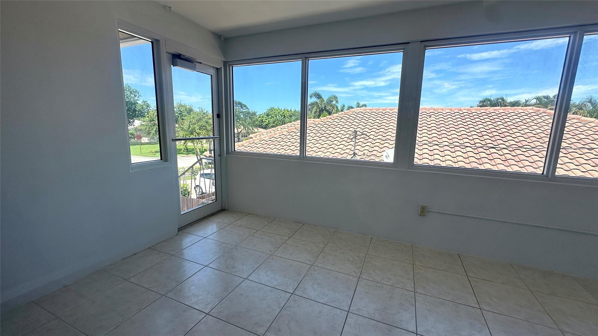 1900 Northeast 29th Street, Unit 2C Lighthouse Point, FL 33064 - Photo 15 of 21 a view of an empty room and window