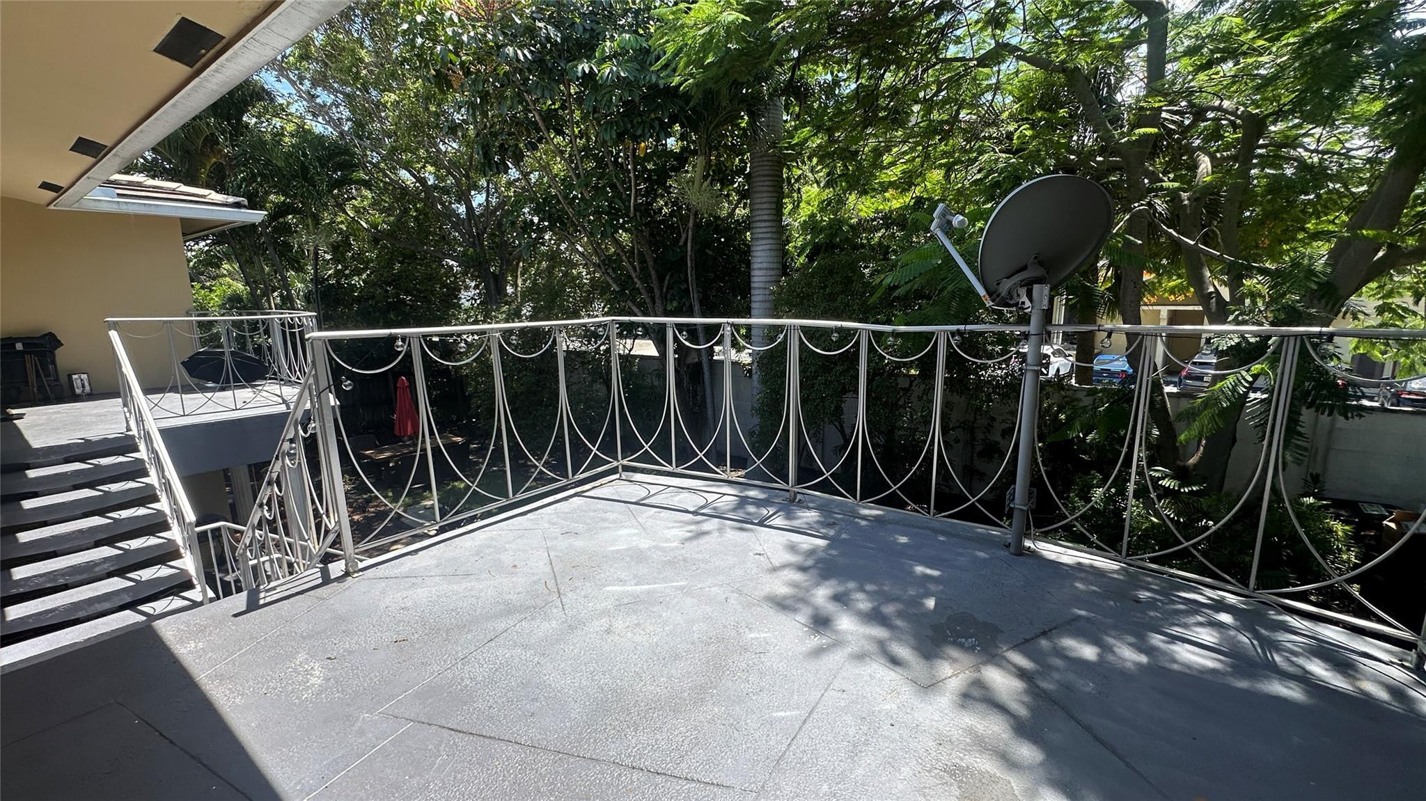 1900 Northeast 29th Street, Unit 2C Lighthouse Point, FL 33064 - Photo 19 of 21 a view of two chairs and table in the patio