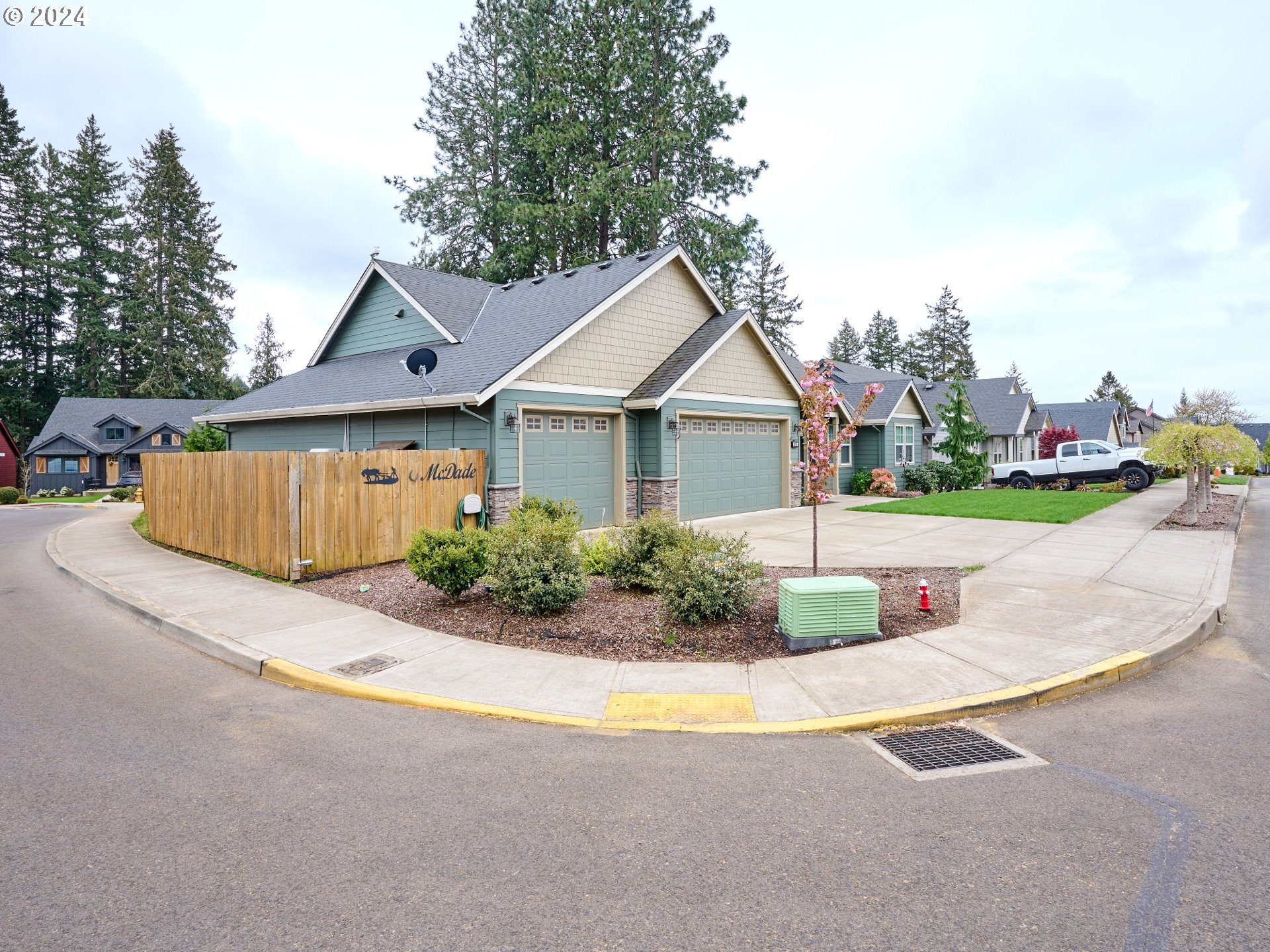 860 Southeast Darrow Road Estacada, OR 97023 - Photo 3 of 6 a front view of a house with a garden