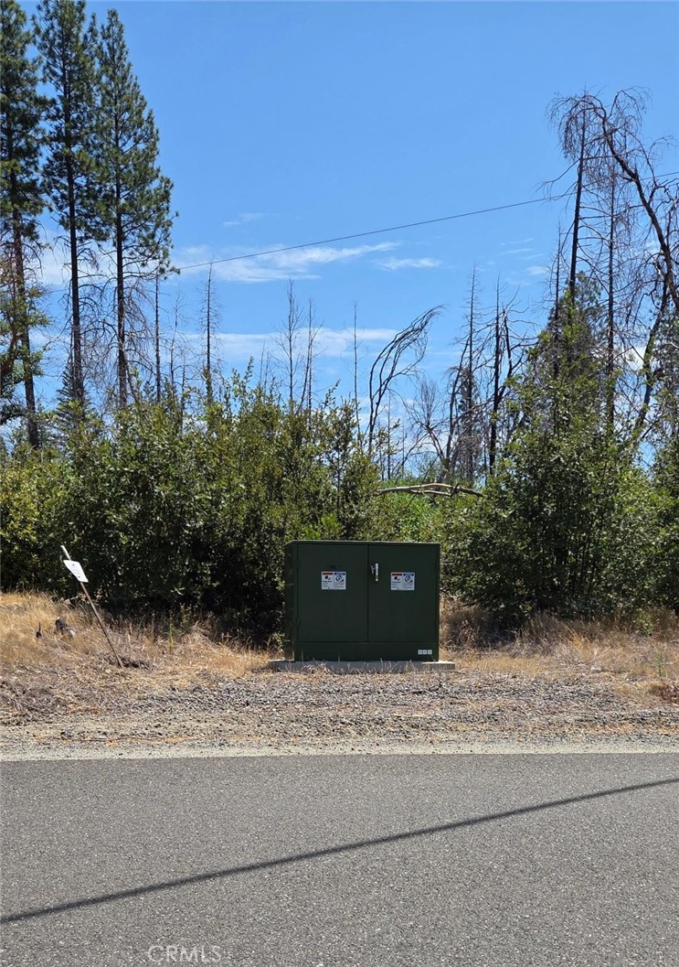 1090 Bald Rock Road Berry Creek, CA 95916 - Photo 10 of 10 a view of a bench in front of a building