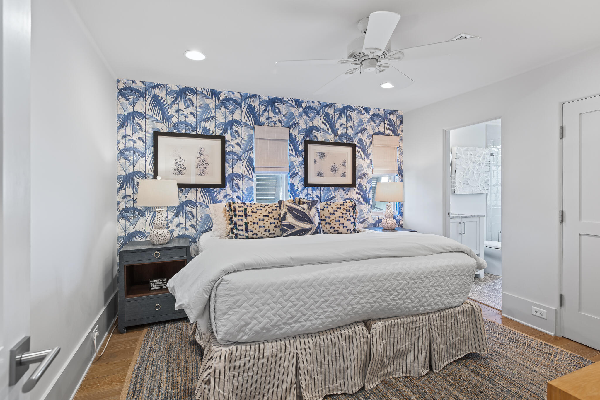 188 Round Road Inlet Beach, FL 32461 - Photo 47 of 98 a bedroom with a large bed chandelier and a window
