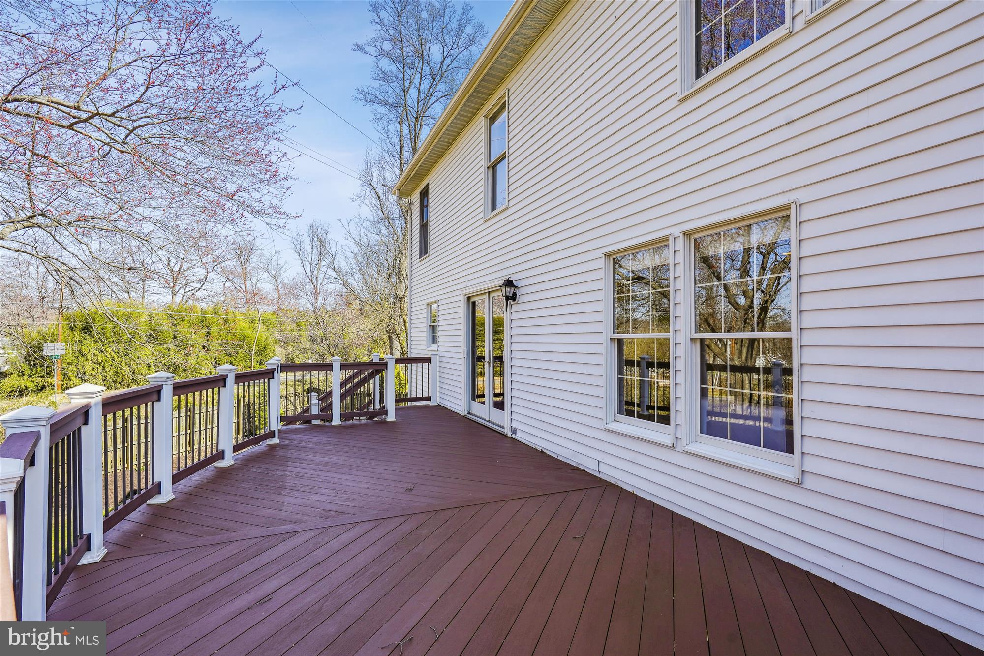 408 Talahi Road Southeast Vienna, VA 22180 - Photo 21 of 58 Newly stained deck, doors with screens